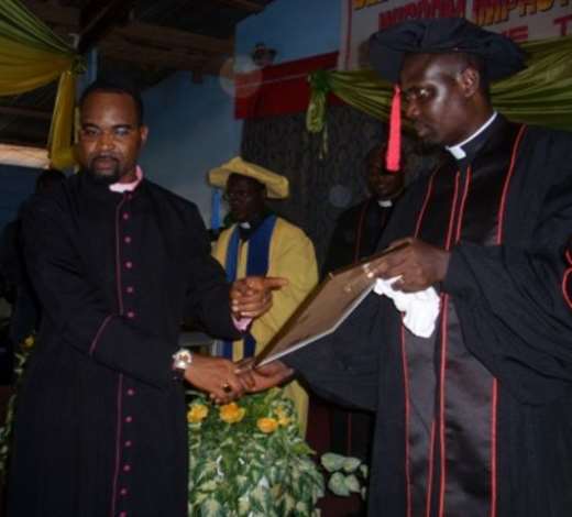 Reverend Albert Duodu (left), receiving Certificate from Reverend Dr Kerry Okoh (left