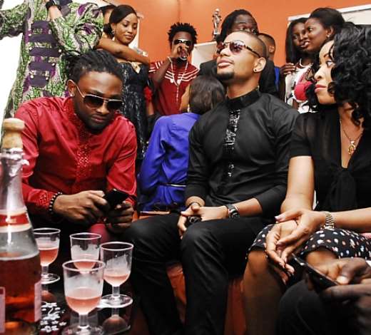 UTI, ALEX EKUBO AND GUESTS INSIDE THE SHOWROOM