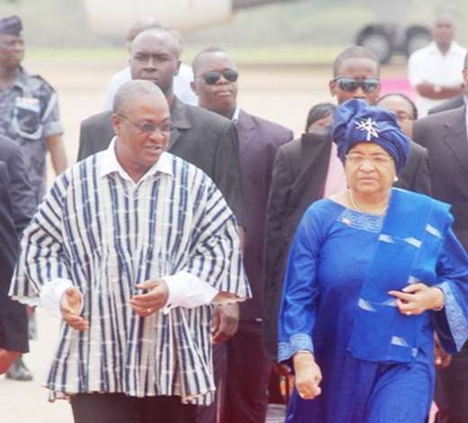 VICE PRESIDENT MAHAMA AND LIBERIAN PRESIDENT MRSJOHNSON-SIRLEAF ON THEIR WAY TO THE JUBILEE LOUNGE