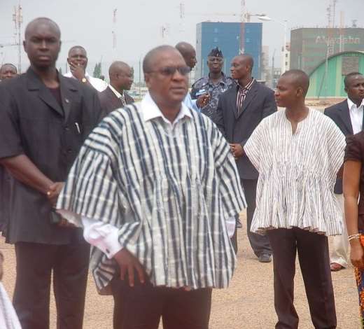 VICE PRESIDENT MAHAMA WAITNG FOR MRSJOHNSON- SIRLEAF, LIBERIAN PRESIDENT ON THE TARMAC AT THE K.I.A.