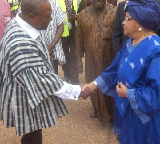 VICE PRESIDENT MAHAMA WELCOMING MRS JOHNSON-SIRLEAF, LIBERIAN PRESIDENT, AT THE K.I.A.