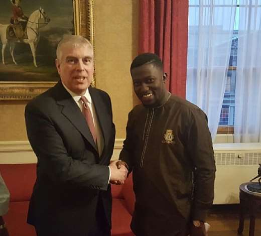 hrh prince andrew duke of york and dayo israel at buckingham palace medium