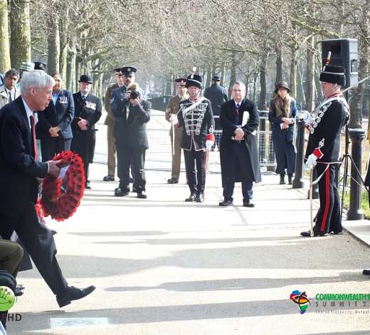 representatives laying wreath medium