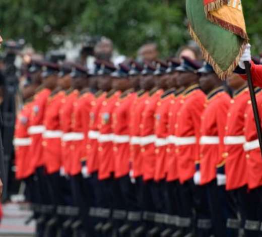 Obama reviews an honour guard at Ghanas Presidential Castle in AccraPhotograph: Saul Loeb/AFP