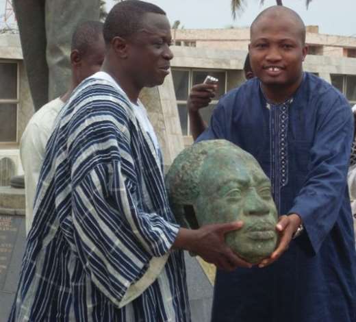 Mr Alex Asum-Ahensah, Minister of Chieftaincy and Culture (left) and Mr Samuel Okudzeto-Ablakwa, Deputy Minister of Information, holding themissinghead of Dr. Kwame Nkrumah