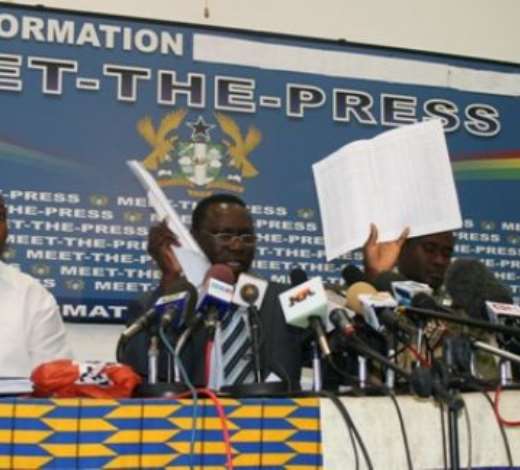 Mr John Tia Akologu, (second left) Minister of Information showing some documents to the media. With him are Mr. Samuel Okudzeto-Ablakwa (extreme left) Deputy Minister of Information, Mr. James Agyenim-Boateng, (second right) Deputy Minister of Information and Mr. Victor Xola Senaya, (extreme right) Chief Director, Ministry of Information.