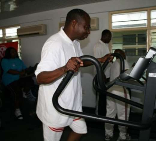 Dr Elias Sory, the Director General of Ghana Health Service, exercising at the new gym open at the Ghana Health Service Head Office.