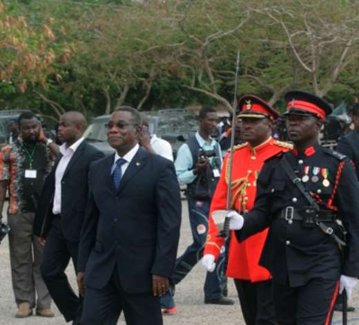 PARADE COMMANDER, OFFICER CADET EMMANUEL ADADE ESCORTS PRESIDENT MILLS TO INSPECT THE PARADE