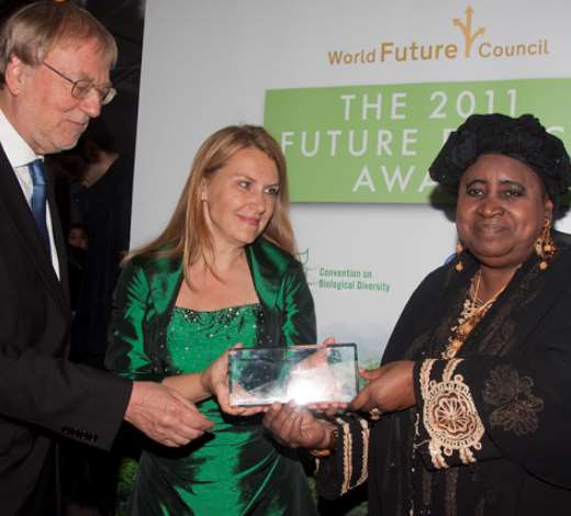 Hon. Isatou Njie-Saidy, Vice President, The Gambia and Secretary of State for Womens Affairs, accepts the 2011 Silver Future Policy Award on behalf of The Gambia’s Community Forest Policy from Jakob von Uexkull, Founder of the World Future Council and Alexandra Wandel, Director of the World Future Council