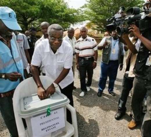 Opposition Presidential candidate John Atta Mills casts his vote at a polling station in Regimanuel Estate in Accra, Ghana Sunday, Dec. 7, 2008. An estimated 12.4 million registered voters, roughly half the country s population of 23 million, will choose from one of eight candidates to succeed President John Kufuor, who is stepping down after two terms as required by law. (AP Photo/Rebecca Blackwell)