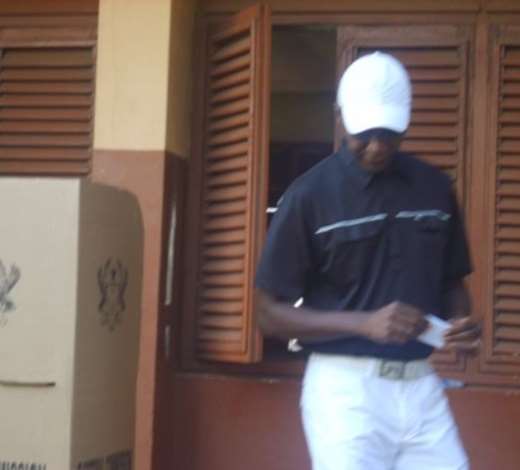 Mr Kwesi Amoafo-Yeboah, Independent Presidential Candidate, folds the presidential ballot paper and gets ready to cast it