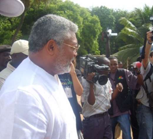 Former President Rawlings addressing the Media on arrival at the Public           Works Department (PWD) Castle Branch polling centre in the           Korle-Clottey constituency in Greater Accra Region