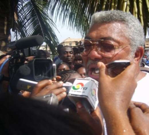 Former President Rawlings talking to some of his admirers after voting