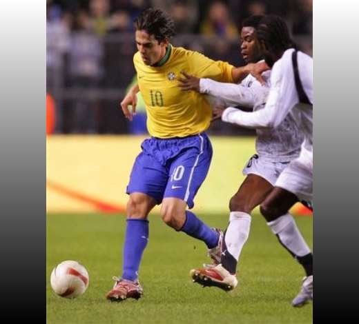 Brazils Kaka, left, keeps ahead of Ghana defender Eric Addo, 2nd right, during the Brazil versus Ghana friendly soccer match, at Rasundra stadium in Stockholm, Sweden, Tuesday March 27, 2007.
