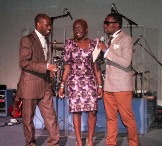 SHOGGY TOSH COLLECTING HIS AWARD FROM LOLA OLUBADEJO & VITAL
