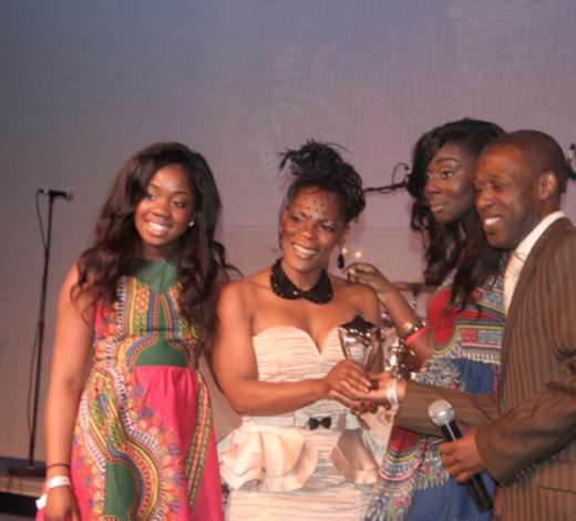 SHOGGY TOSH PRESENTED THE AWARD ALBUM OF THE YEAR TO SONNIE BADUS FAMILY