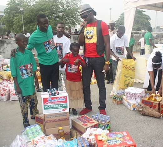 UTI PRESENTING SOME FOOD ITEMS TO THE PHYSICALLY CHALLENGED CHILDREN