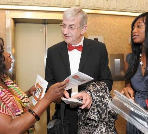 PH-4024- MRS. MERCY BOLUS WELCOMING THE MANAGING DIRECTOR OF GILLMAN & SONS AND A COLLEAGUE OF HIS