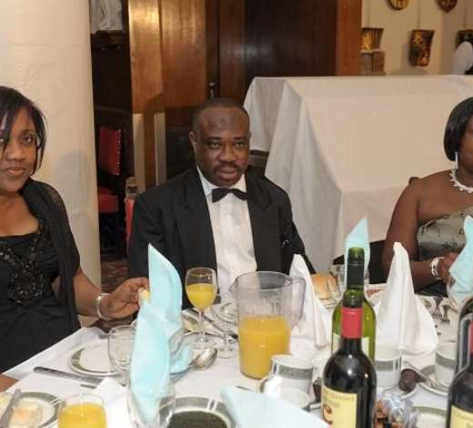 PH-4083- MR. AND MRS. EUNICE AMUSU WITH ONE OF THE INVITED GUESTS