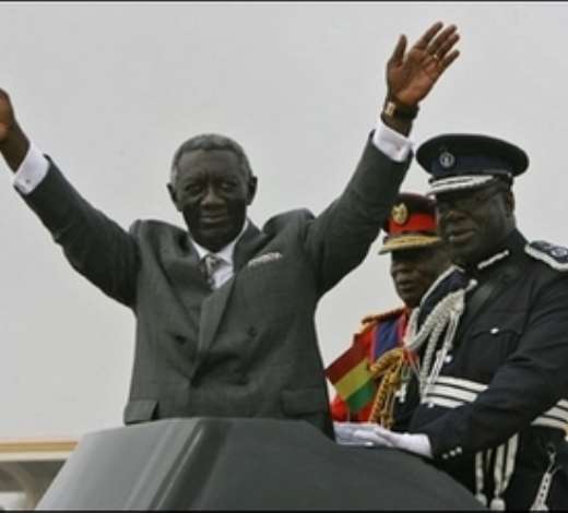 Ghanaian President John Kufuor salutes supporters during celebrations of the 50th anniversary of Ghanas independence in Accra. Ghanaians turned out in their thousands Tuesday for the colourful ceremonies.(AFP/Kambou Sia)