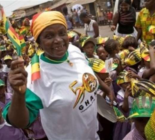 A woman waves a make-shift Ghanaian flag, ahead of Ghana 50 years independent celebrations at Accra, Ghana, Monday, March 5, 2007. Fifty years on, battered by political repression, military dictatorship and economic collapse that has bedeviled the entire continent, Ghanas hopes are diminished, even after seeing its first peaceful and democratic changeover of government in 2000. The West African nations Golden Jubilee on Tuesday is prompting some sober reflection on why Africa has failed to translate its dreams, and its bounty of mineral and agricultural resources, into wealth.(AP Photo/Olivier Asselin)