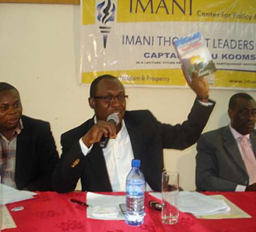 Mr. Kofi Bentil introducing the  Selected Essays in Political Economy by Frederic Bastiat, with an introduction by Franklin Cudjoe to the audience