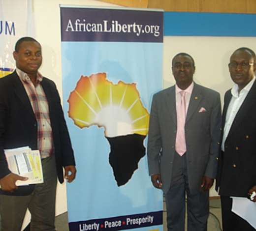 Captain Budu Koomson in the middle with IMANI-AfricanLiberty s Franklin Cudjoe and Kofi Bentil