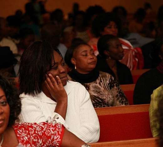 SOME OF THE CHURCH MEMBERS HEARING THE WORD OF GOD