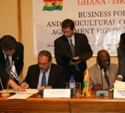 Alhaji Muhammad Mumuni, Ghana s Foreign Minister (right), signing the Agreement and Joint Declaration with Mr Avigdor Liberman, Deputy Prime Minister /Foreign Minister of Israel (left).