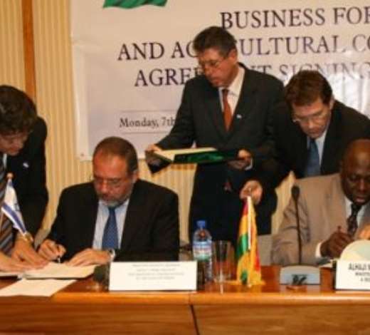 Alhaji Muhammad Mumuni, Ghana s Foreign Minister (right), signing the Agreement and Joint Declaration with Mr Avigdor Liberman, Deputy Prime Minister /Foreign Minister of Israel (left).
