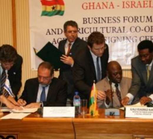 Alhaji Muhammad Mumuni, Ghana s Foreign Minister (right), signing the Agreement and Joint Declaration with Mr Avigdor Liberman, Deputy Prime Minister /Foreign Minister of Israel (left).
