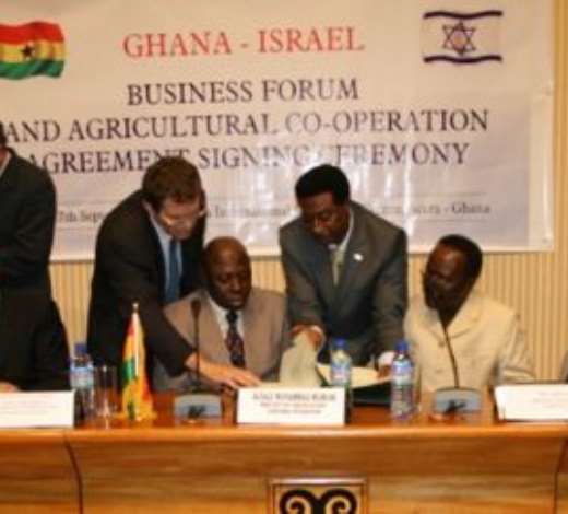 Alhaji Muhammad Mumuni, Ghana s Foreign Minister (right), signing the Agreement and Joint Declaration with Mr Avigdor Liberman, Deputy Prime Minister /Foreign Minister of Israel (left).