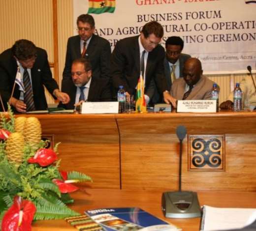 Alhaji Muhammad Mumuni, Ghana s Foreign Minister (right), signing the Agreement and Joint Declaration with Mr Avigdor Liberman, Deputy Prime Minister /Foreign Minister of Israel (left).