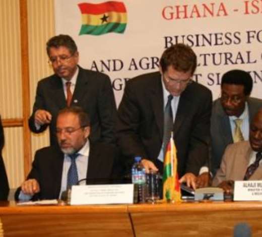 Alhaji Muhammad Mumuni, Ghana s Foreign Minister (right), signing the Agreement and Joint Declaration with Mr Avigdor Liberman, Deputy Prime Minister /Foreign Minister of Israel (left).