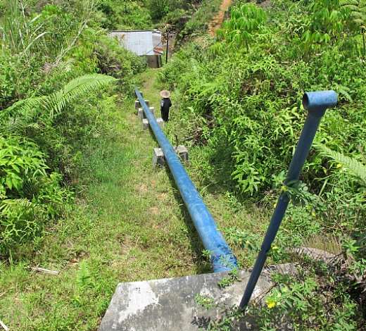 IBEKA - Community-owned micro hydro: A relief valve, penstock and power house
