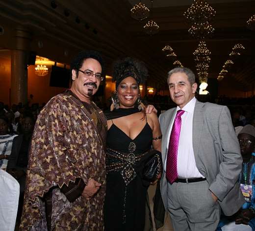 L-R: Nollywood actress, Cossy Orjiakor and Zimbabwe Rock star, Dear Zim on stage to present award at the All Africa Music Awards ceremony held at the Grand Ballroom, Oriental hotel, Lagos recently.