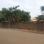 A walled and gated plot of land for sale