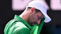Australian Open 2026: Novak Djokovic scrapes into semi-finals as Lorenzo Musetti retires injured when two sets up