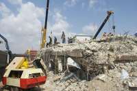 Two dead, 14 rescued after building collapse near Newtown school