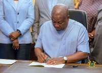 Mahama signs five bills into law, seals move to restore NIB to BNI