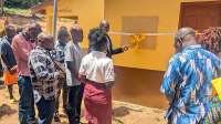 Ampenyi M/A Basic School teachers commission washroom facility, launches regimental Band; breaks ground for Assembly grounds