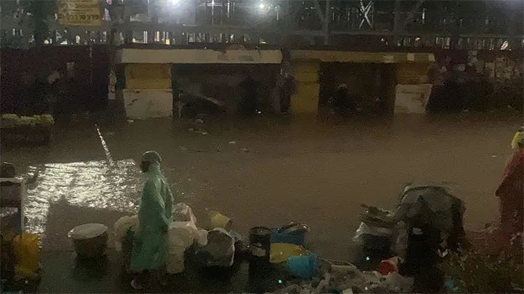 Choked drains trigger flooding at Dr. Mensah market