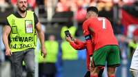 Euro 2024: Martinez 'concerned' after pitch invaders seek Ronaldo selfies