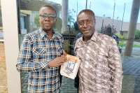 Captain Smart receives copy of DC Kwame Kwakye's fatherhood book