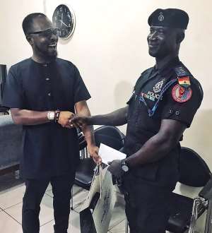 [Photos]    KOD rewards policeman who saved lives during floods