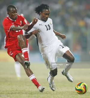 Baffour Gyan of Ghana and Jamunovamdu Ngatjizeko of Namibia during the Group A, 2008 CAF African Cup of Nations match between Ghana and Namibia at the Ohene Djan Stadium in Accra, Ghana, West Africa. (Photo by ben radford/Corbis via Getty Images)