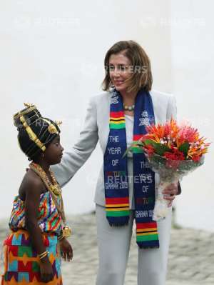 Pelosi, a Congressional delegation pays tribute to Ghana's rich tradition at a ceremony with supreme leaders, visiting historic sites devoted to slaves to mark "the year of return"