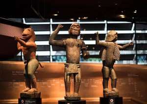Royal statues, Dahomey, Republic of Benin, now in Muse du Quai Branly, Paris, France. Left, King Gll, half-lion, half- man. Centre, King Ghzo, half-bird, half-man. Right, King Bhanzin, half-shark, half-man. To be returned soon to Republic of Benin.