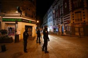 A curfew was imposed in some areas of France with police patrolling the streets.  By FRANCK FIFE (AFP)