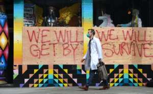 A doctor visits homeless people in the Haight Ashbury area of San Francisco as part of the US response to the coronavirus outbreak.  By Josh Edelson (AFP)
